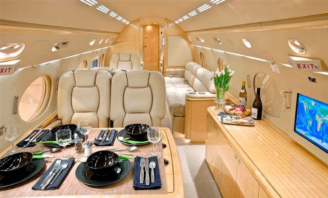 Gulfstream V cabin with a set dining table in the 2014 archive